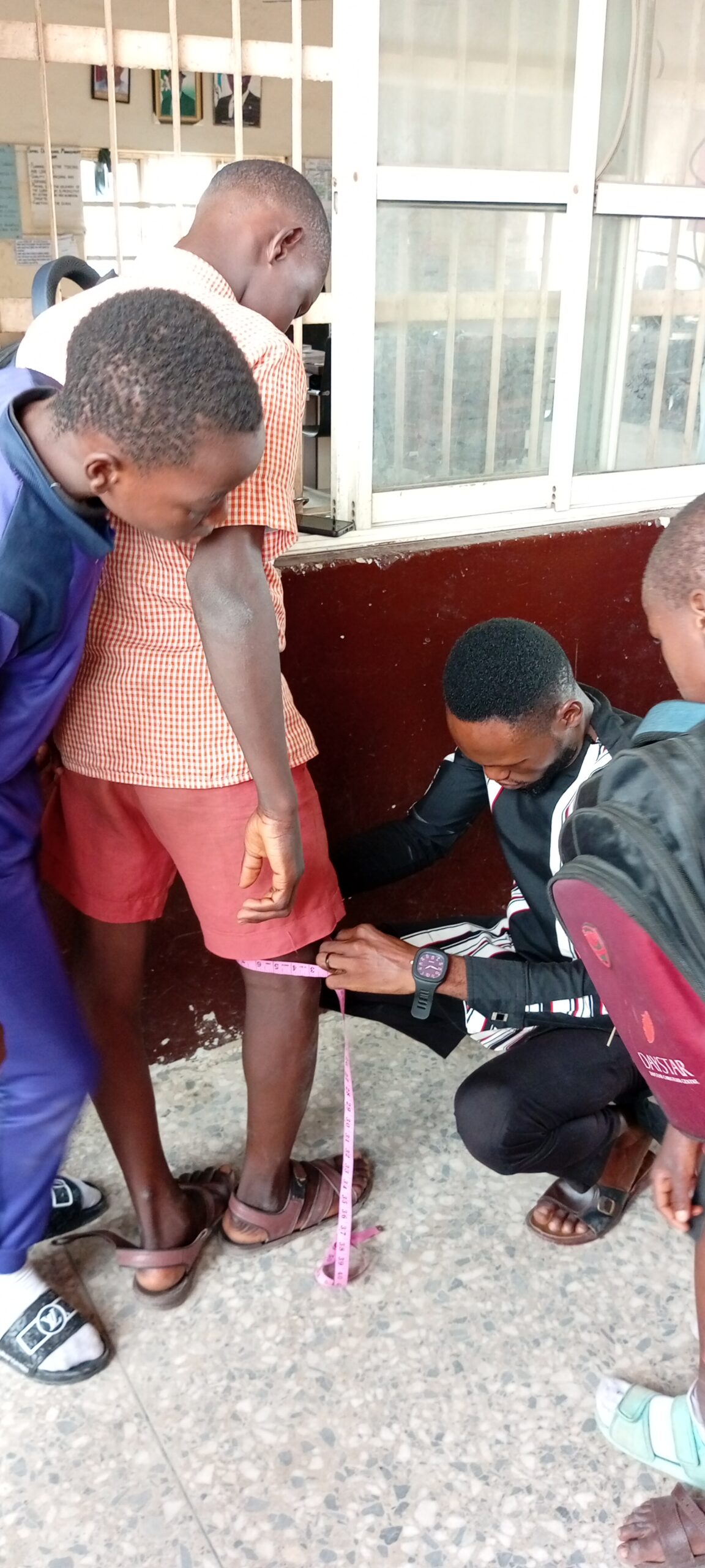 Pupils in classroom recording a thank-you video to SHINE